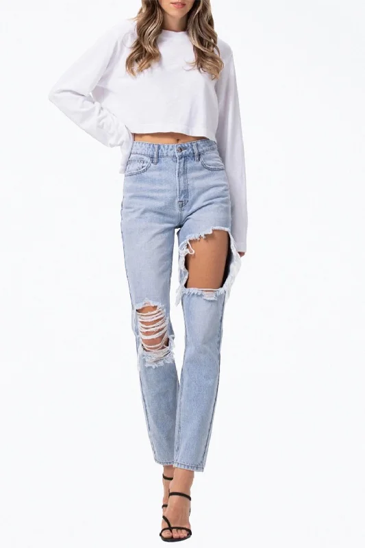 High-Rise Distressed Tapered Jeans In Light Blue